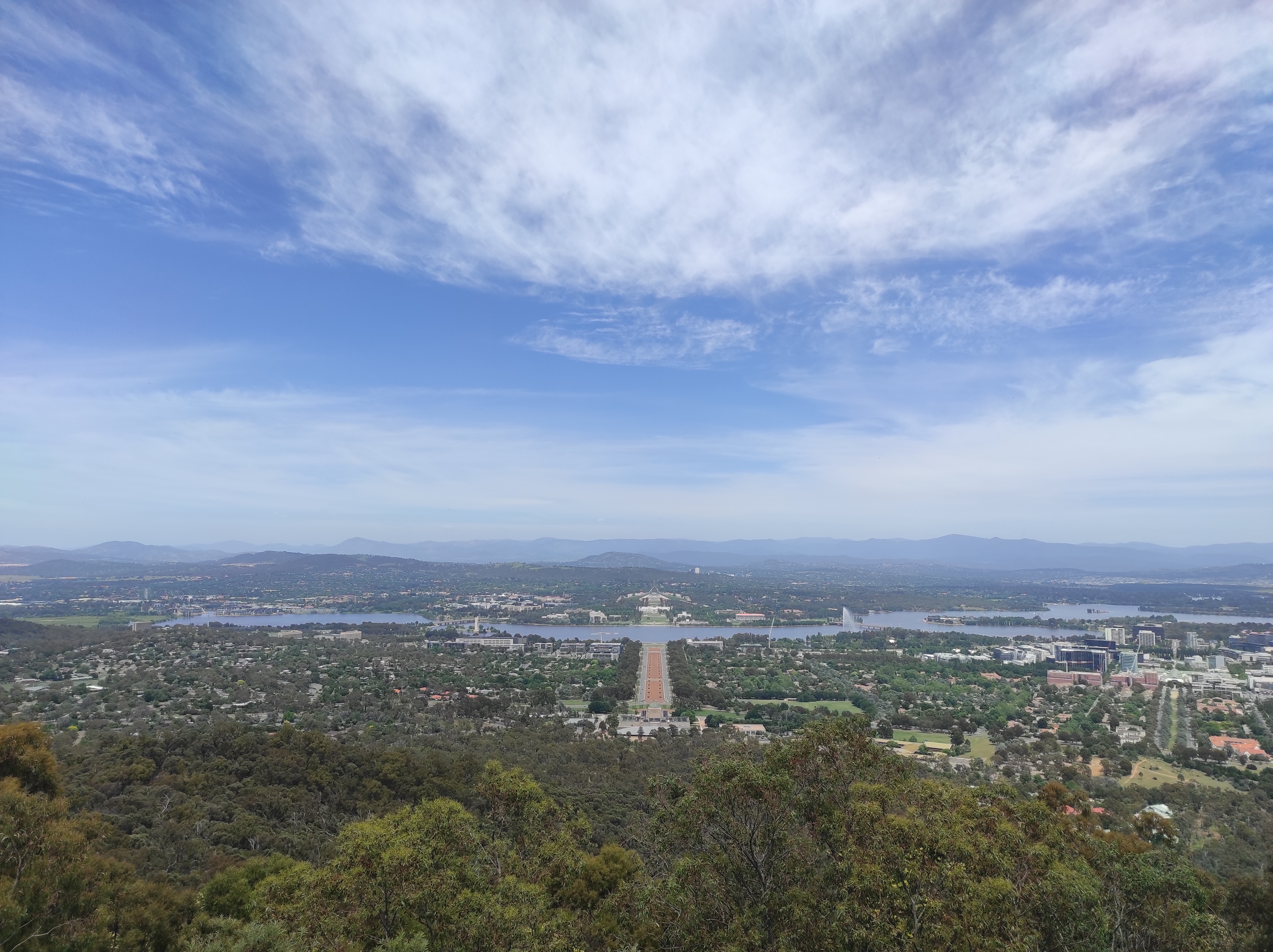 View of Canberra from the top of a hill with perspective on the Parliamentary Triangle