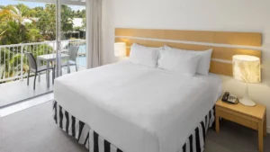 oaks resort port douglas 2 bedroom pool view bedroom 11920x1080 1 300x169